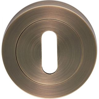 Carlisle Brass Escutcheon Std Lock on Concealed Rose Antique Brass